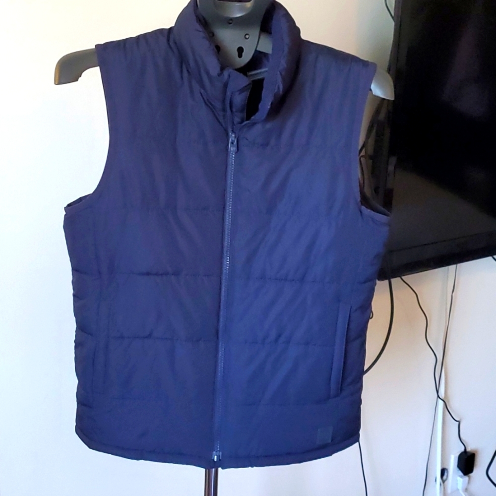 Boys winter vest navy blue.  XL Gap. Can fitsmall women.Like new worn once